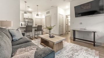 Apartment (1 Bedroom) | Living area | 50-inch TV with digital channels