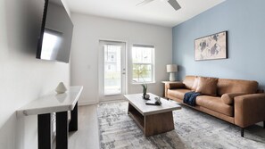 Apartment (1 Bedroom) | Living area | 50-inch TV with digital channels - Landing Apartments near JAX (Jacksonville)