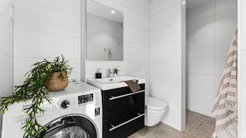 Apartment, 1 Bedroom, Balcony, Garden View | Laundry