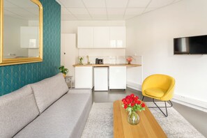 Apartment | Living area | 32-inch Smart TV with cable channels, Netflix, streaming services