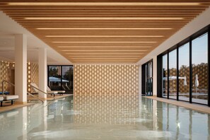Indoor pool, outdoor pool, pool umbrellas, sun loungers