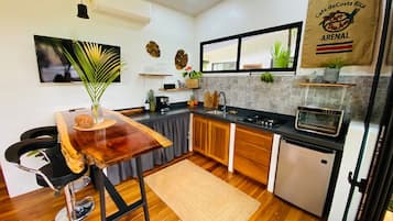 Fridge, oven, highchair, cookware/dishes/utensils