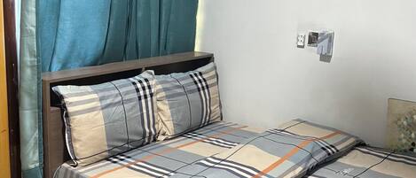 Desk, laptop workspace, blackout curtains, iron/ironing board