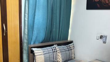 Deluxe Studio | Desk, laptop workspace, blackout drapes, iron/ironing board