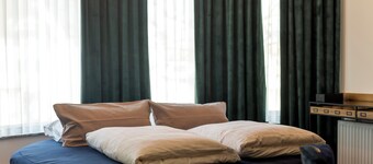 Studio Deluxe Apartment w Round Bed at Kavenija Aprtments