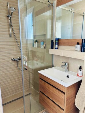 Hair dryer, towels, soap, toilet paper