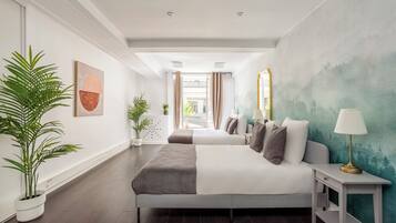 Hypo-allergenic bedding, pillow-top beds, in-room safe