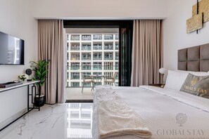 Luxury Studio, 1 Queen Bed, Balcony, City View | Individually decorated, individually furnished, desk, iron/ironing board - GLOBALSTAY Azizi Riviera 67 (Dubai)