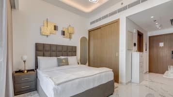 Luxury Studio, 1 Queen Bed, Balcony, City View | Individually decorated, individually furnished, desk, iron/ironing board