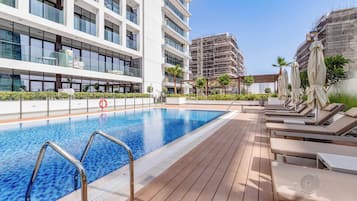 Outdoor pool, pool umbrellas, pool loungers