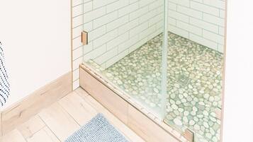 Shower, towels, soap, toilet paper