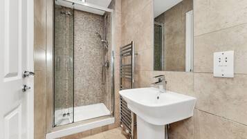 Shower, free toiletries, hair dryer, towels