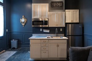 Fridge, microwave, stovetop, coffee/tea maker