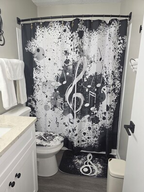 Hair dryer, towels, soap, toilet paper