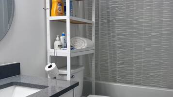 Hair dryer, towels, soap, toilet paper