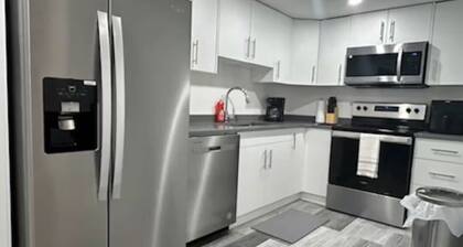 Spacious living room, King Size bed. 2 mins from the Regina airport .