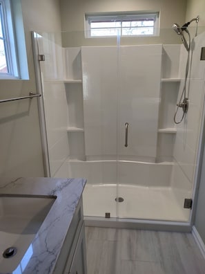 Shower, hair dryer, towels, soap - New 3-bedroom house near downtown Tulsa. (Tulsa)