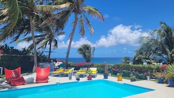 Comfort Villa, 2 Bedrooms, Non Smoking, Partial Sea View | Pillow-top beds, in-room safe, individually decorated