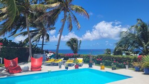 Comfort Villa, 2 Bedrooms, Non Smoking, Partial Sea View | Pillowtop beds, in-room safe, individually decorated