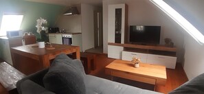 Smart TV, DVD player, foosball, books