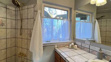 Hair dryer, towels, soap, shampoo