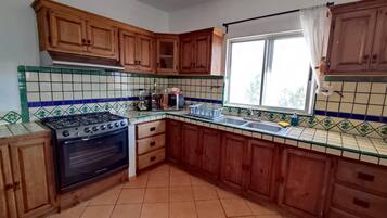 Family Apartment, 2 Bedrooms, Bay View, Beachfront | Private kitchen | Reusable coffee/tea filters