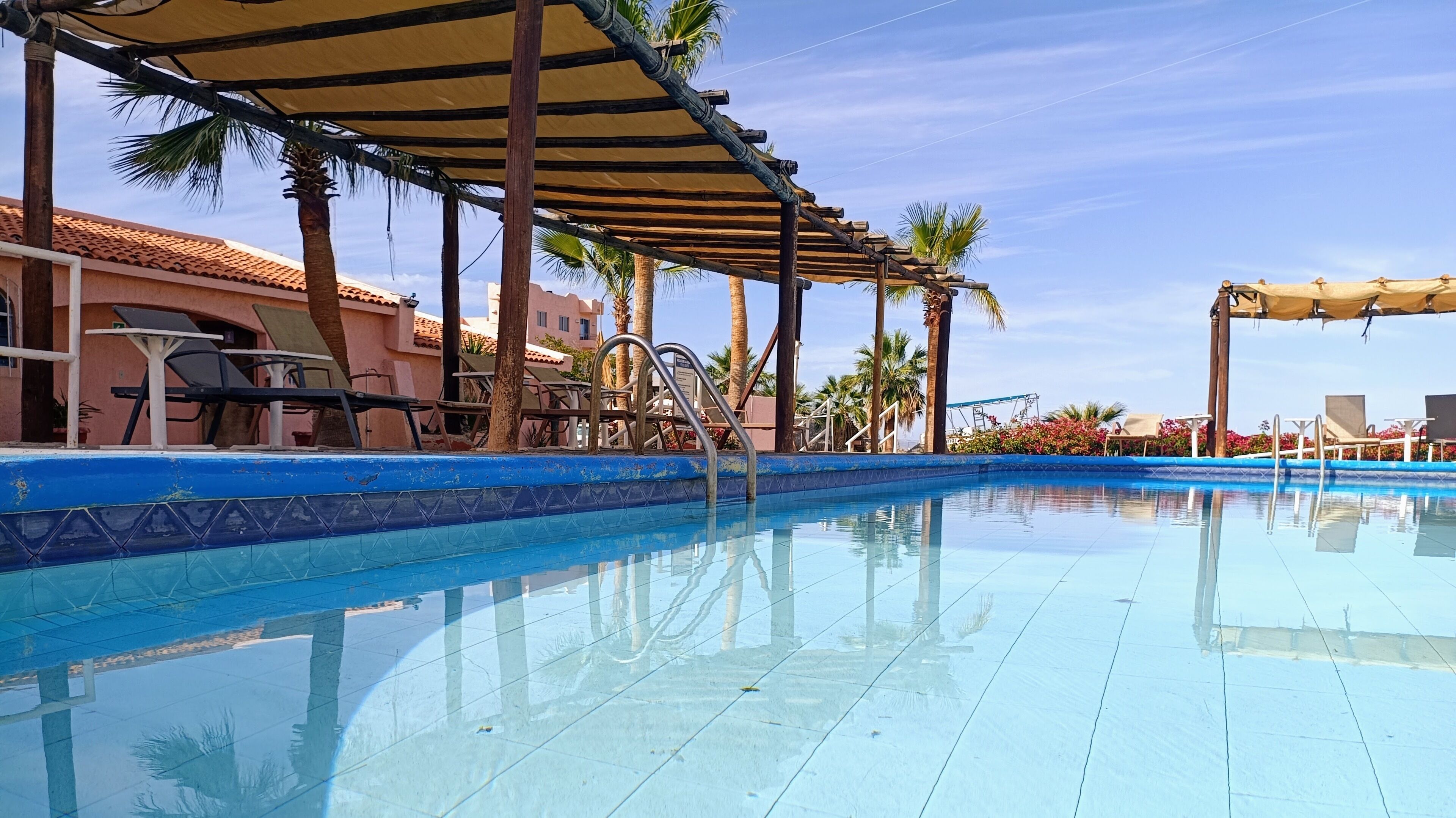 Outdoor pool, pool umbrellas, pool loungers