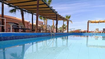 Outdoor pool, pool umbrellas, pool loungers