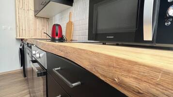 Réfrigérateur, micro-ondes, four, lave-vaisselle