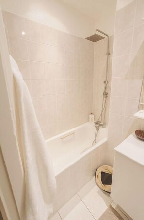 Hair dryer, towels, soap, shampoo