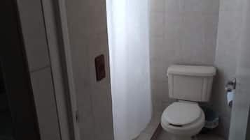 Bathtub, towels, soap, shampoo