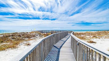 On the beach, sun loungers, beach towels