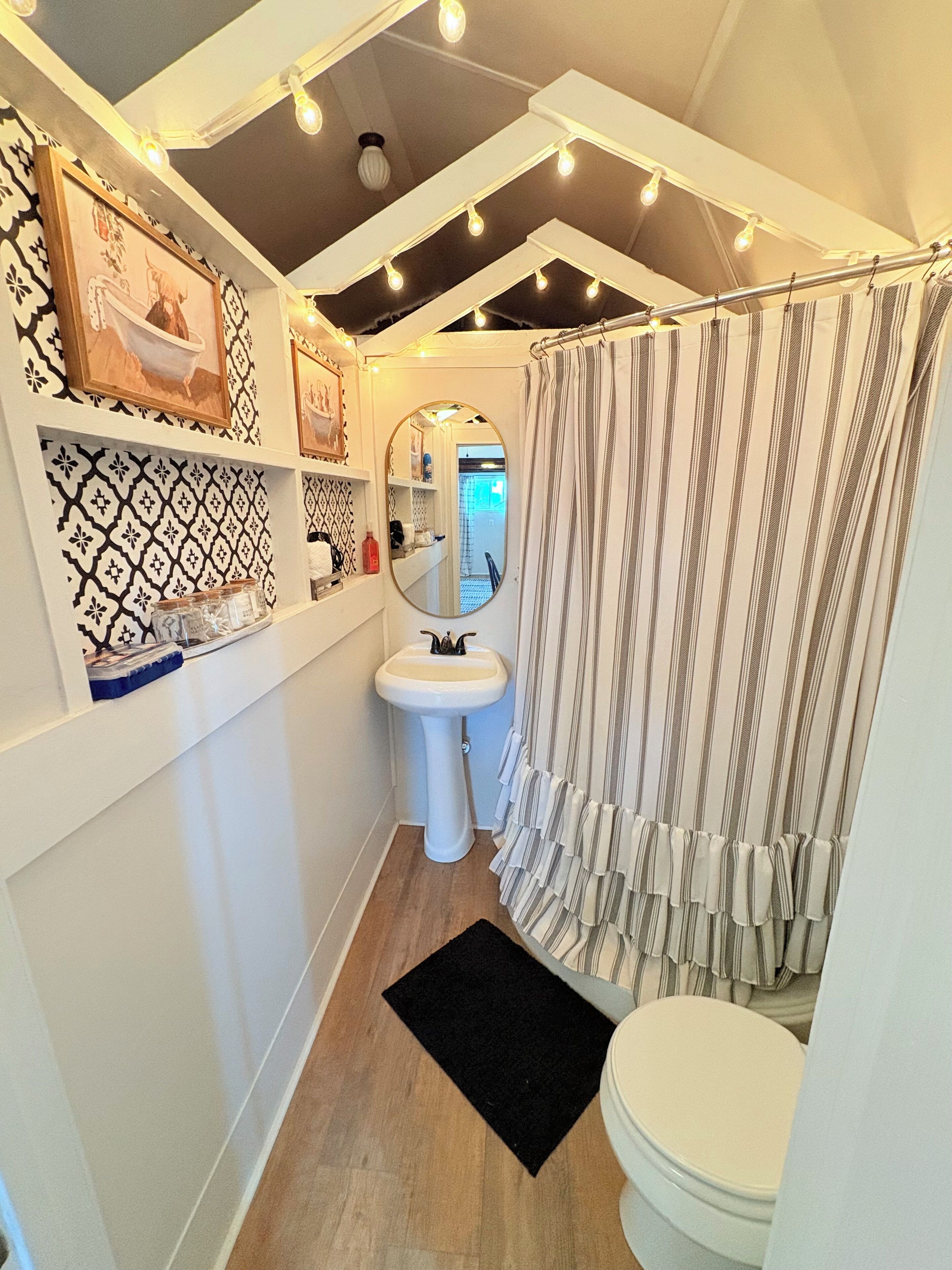 Shower, hair dryer, towels, toilet paper