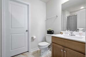 Shower, towels, soap, toilet paper