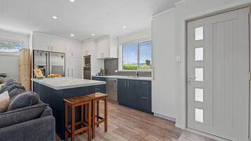 Fridge, microwave, dishwasher, coffee/tea maker