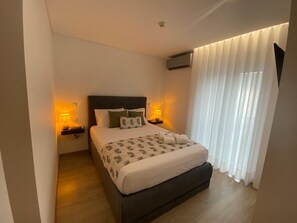 1 غرفة نوم ومكواة/لوح كي وواي فاي وملاءات أسرّة