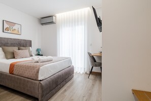 1 slaapkamer, een strijkplank/strijkijzer, wifi, beddengoed