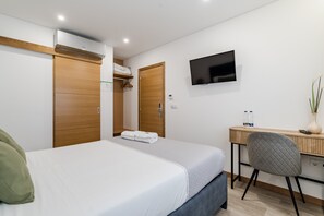 1 habitación, tabla de planchar con plancha, wifi y ropa de cama 