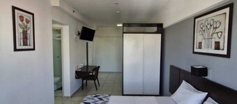Aquarius Rooms: cozy, spacious, and close to the main attractions.