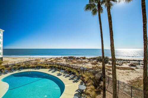 Bright and spacious condo with beach & ocean views, pool, basketball & balcony