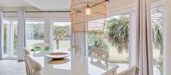 Bright villa with lagoon & fairway views - walk to the beach & golf