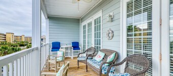 Second-level beachfront villa w/ shared pool, ocean views, & balcony