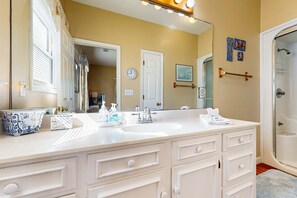 Shower, hair dryer, towels, shampoo