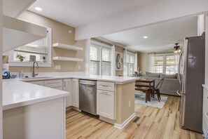Fridge, microwave, oven, stovetop - Charming home steps from beach with two full kitchens, deck, patio, WiFi & AC (Folly Beach)