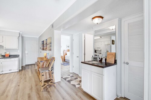 Comfortable villa one row away from the beach w/shared pool & grills