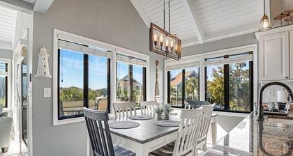 Stylish beach villa with three decks, and golf course views