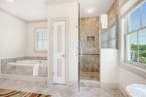 Shower, hair dryer, towels, shampoo