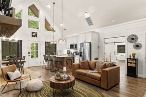 TV, fireplace - Romantic Cabin | Hot Tub · Games · Fire Pit (Broken Bow)