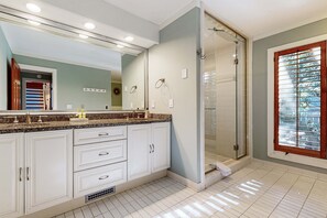 Shower, hair dryer, towels, shampoo