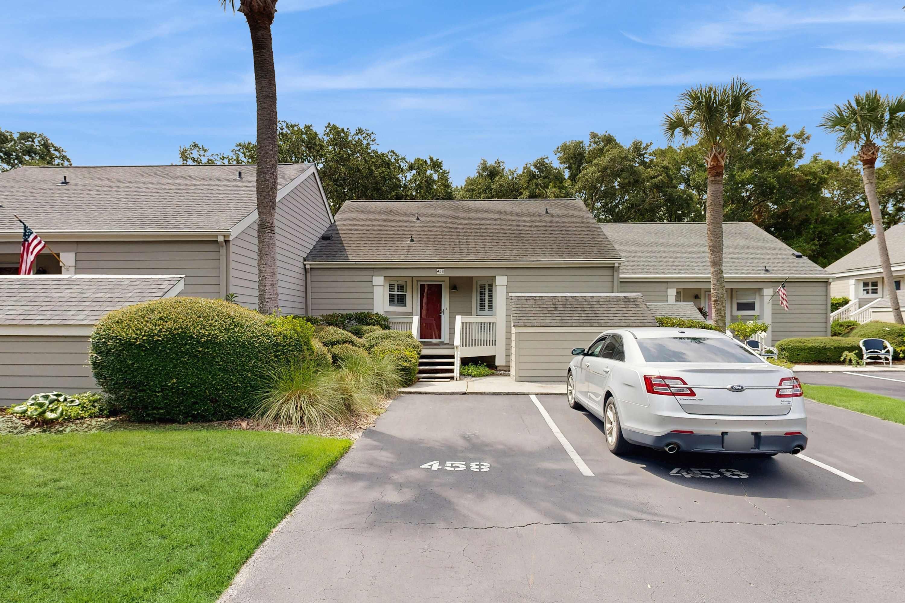 A residential building with a parking space marked 458.